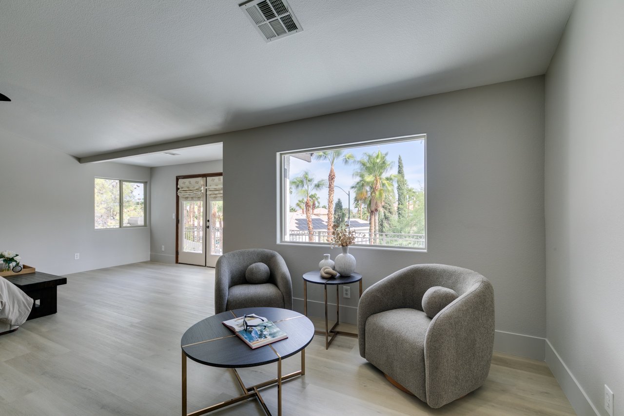 luxury-home-staging-paseo-summerlin-las-vegas-primary-bedroom-sitting-area-staged-to-sell