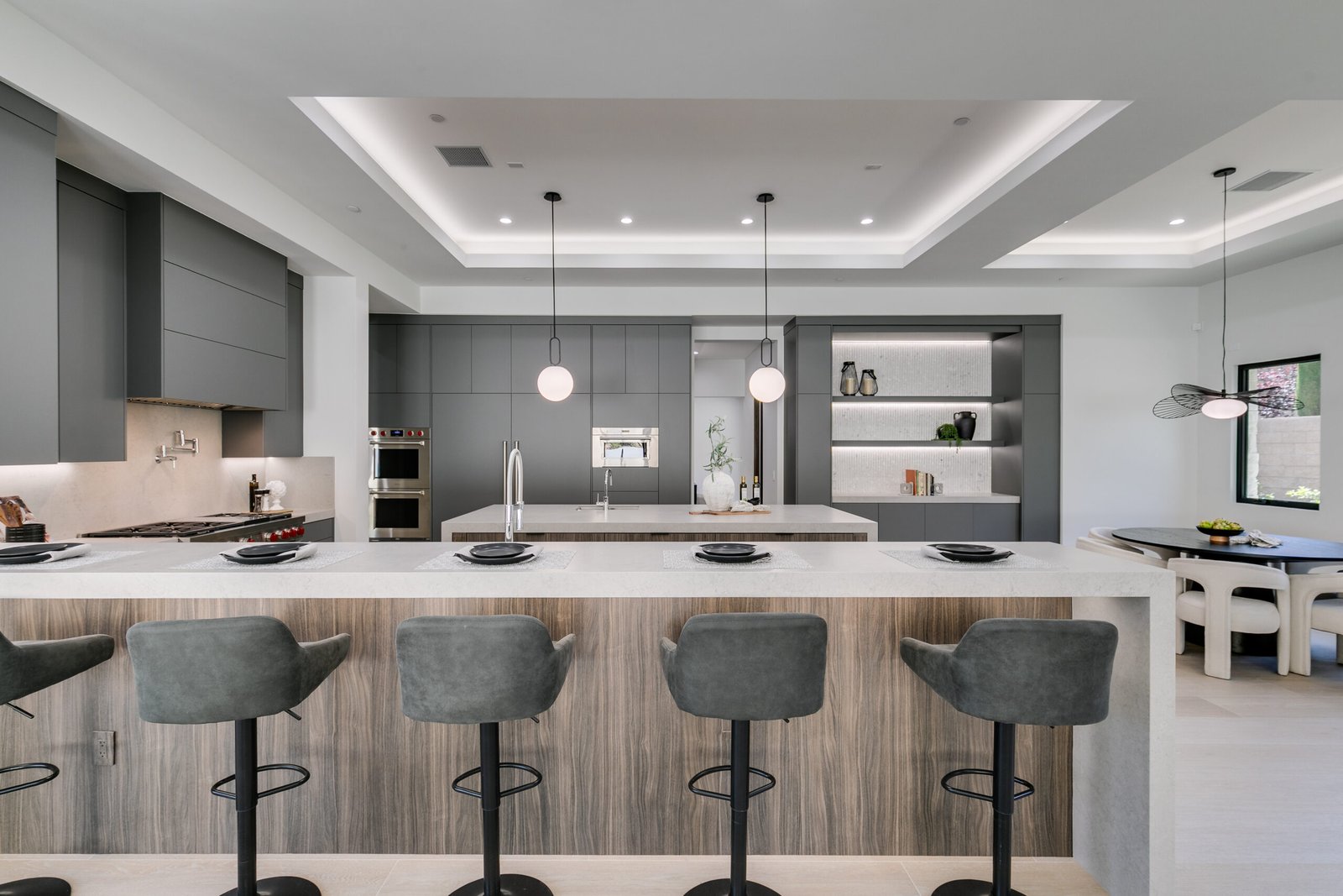 luxury-home-staging-ravenswood-kitchen-island-eating-area-new-construction-southern-las-vegas-staged-to-sell