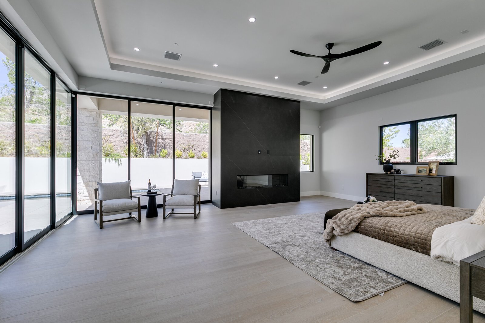 luxury-home-staging-ravenswood-primary-bedroom-fireplace-new-construction-southern-las-vegas-staged-to-sell